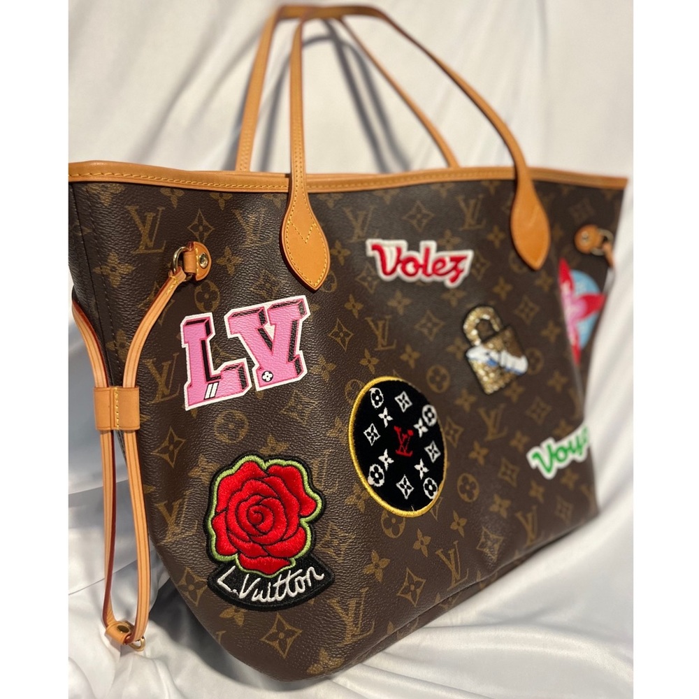 famous Lv bag traditional signature LV Monogram brown canvas with patches.